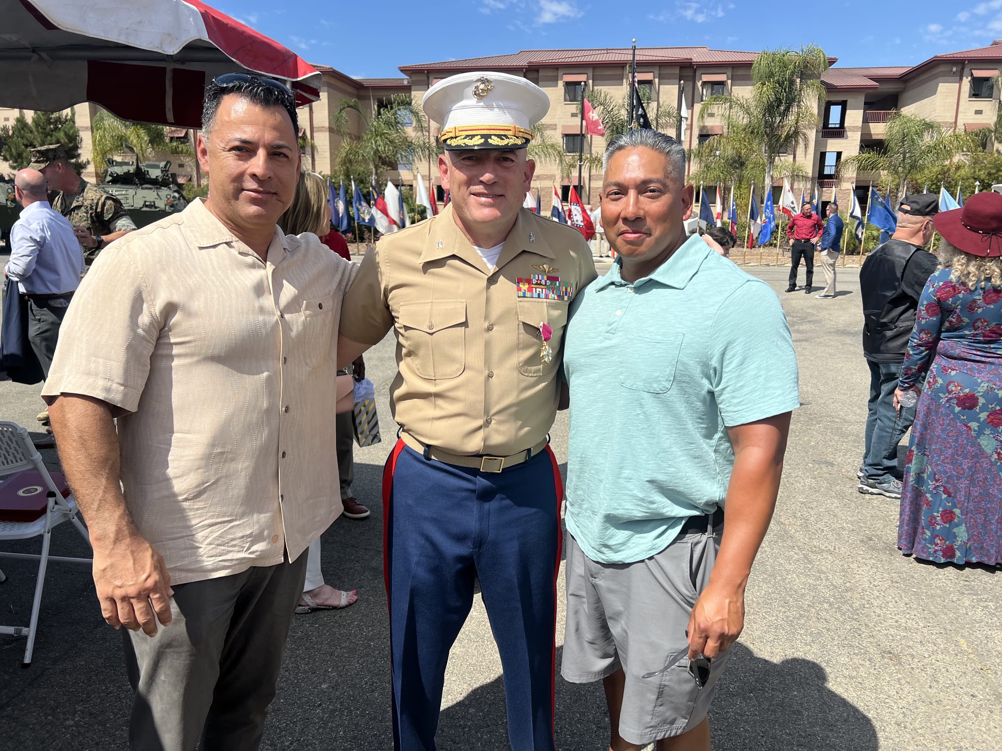 Israel Martinez reuniting with Marine officer at base event